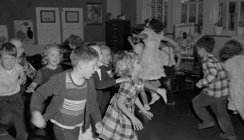 Kids playing in a classroom